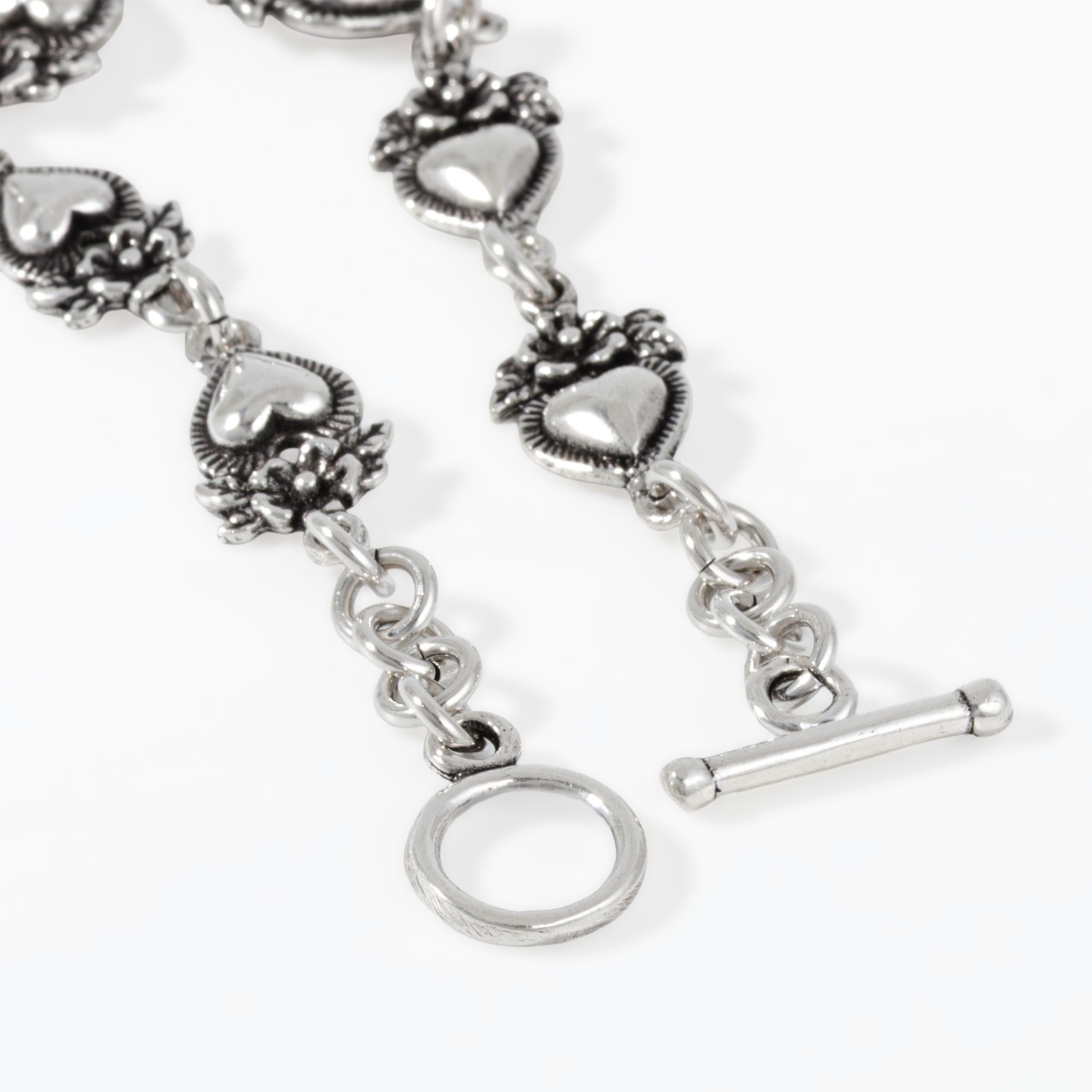 Sterling Silver Flowered Hearts Bracelet