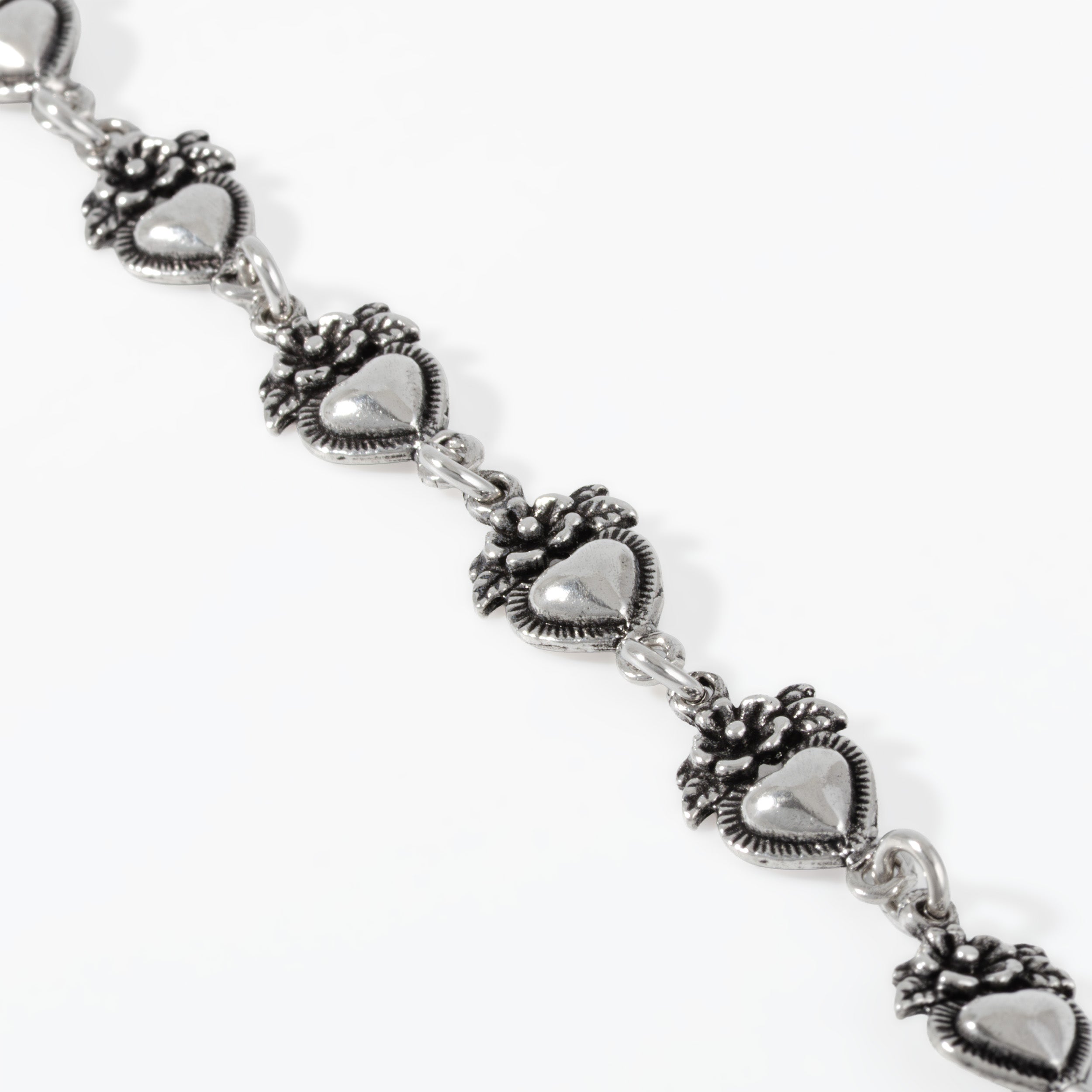 Sterling Silver Flowered Hearts Bracelet
