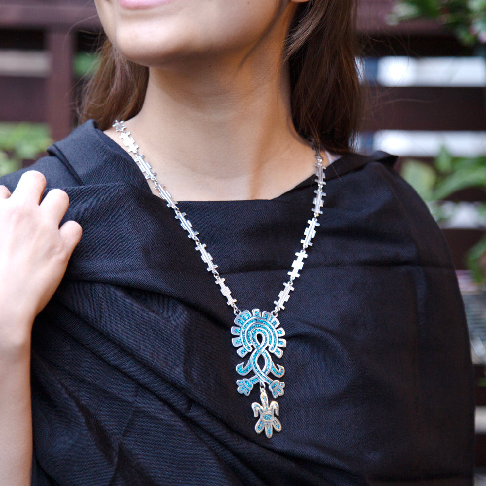 Sterling Silver Glyph of the Wind Faux Turquoise Necklace