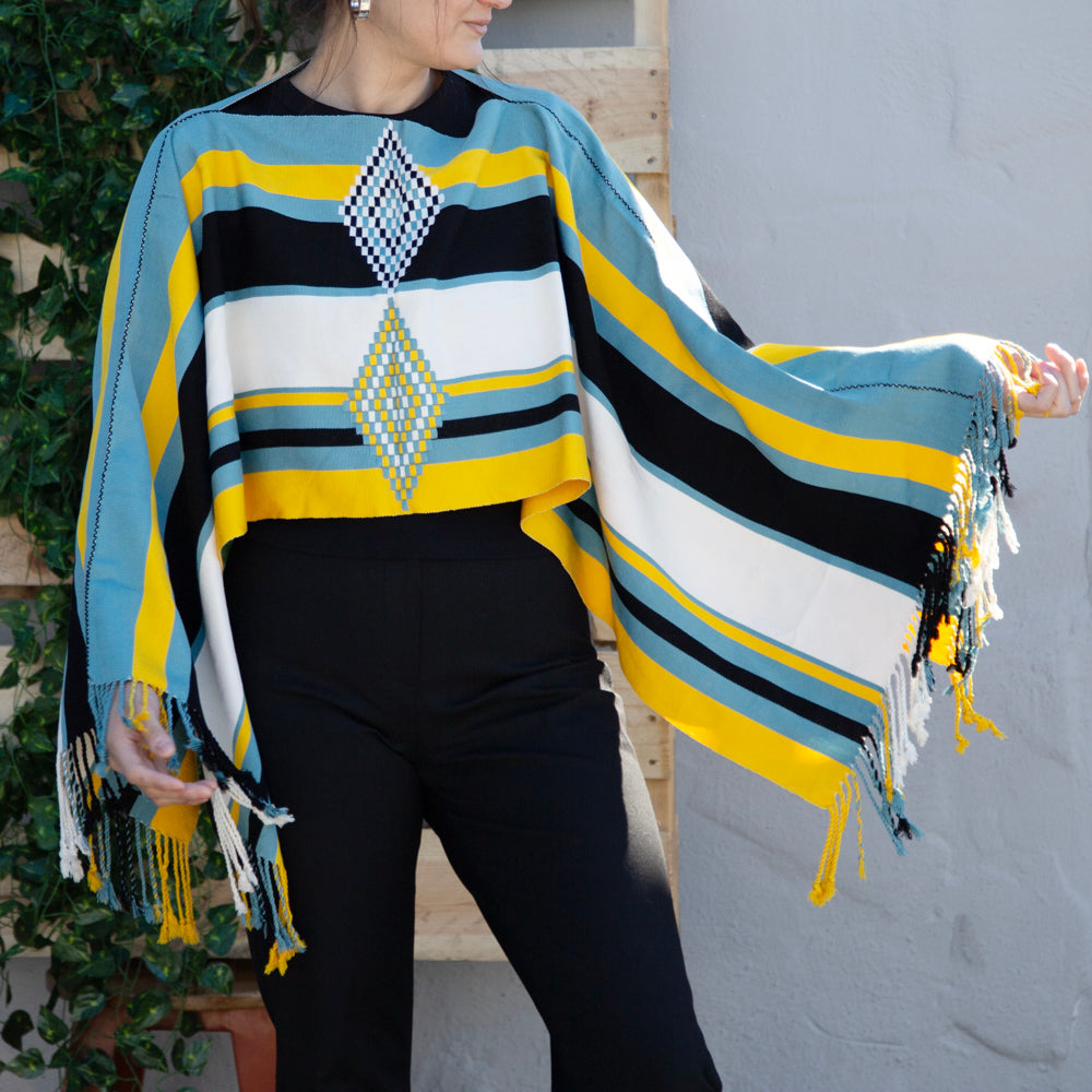 Oxchuc Lines and Rhombus Poncho | Lolo Modern Mexican Mercadito Oxchuc Lines and Rhombus Poncho | Lolo Modern Mexican Mercadito