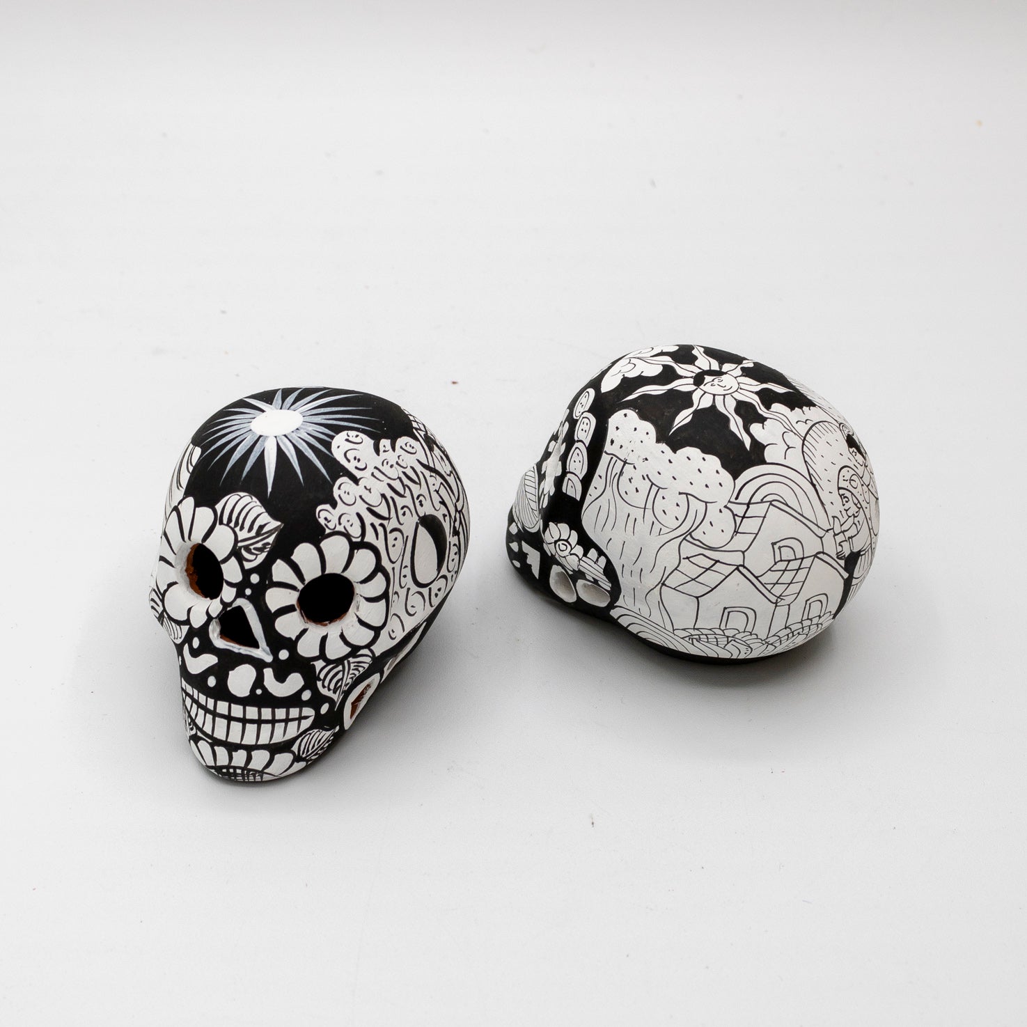 Storytelling Hand-Painted Black and White Xalitla Clay Sugar Skull