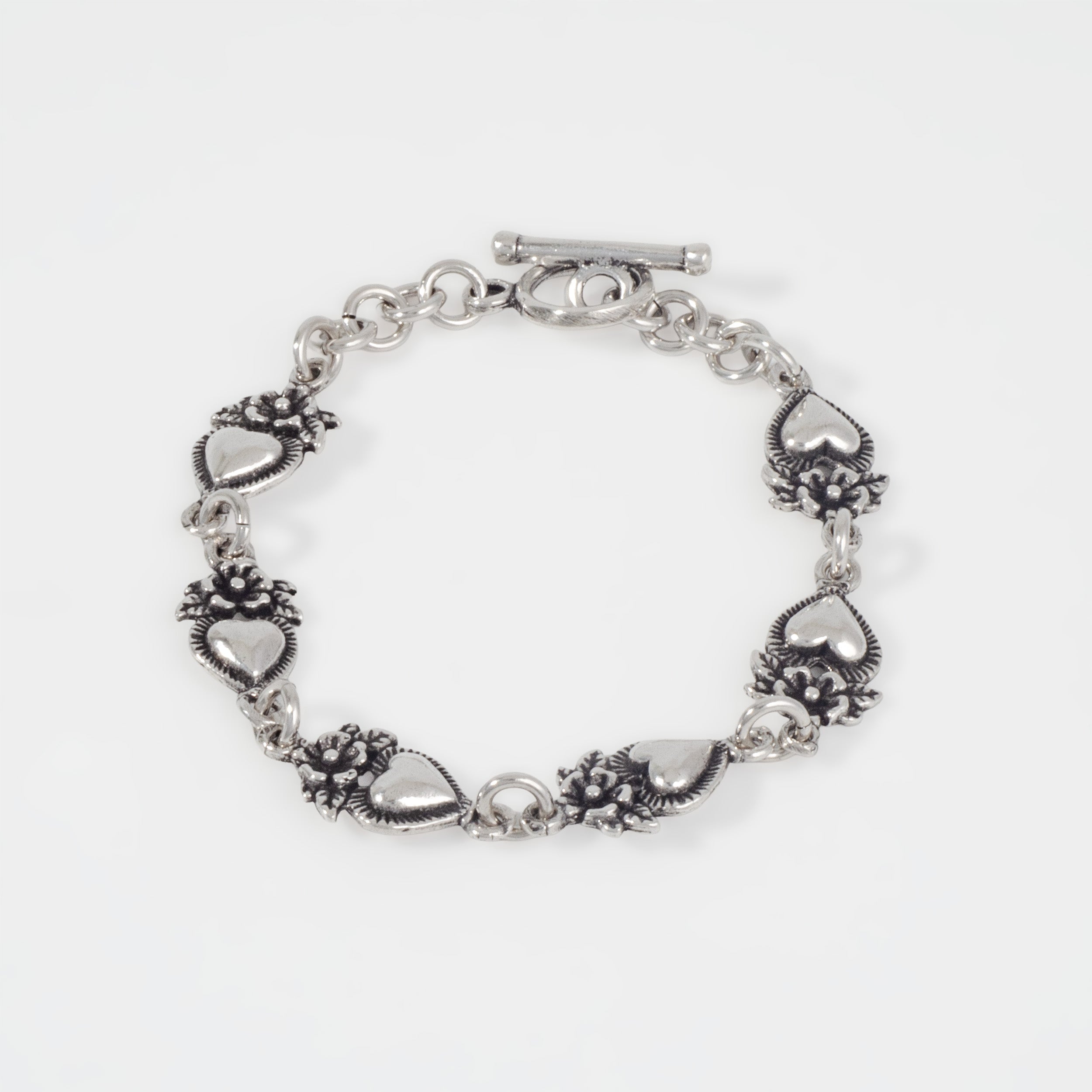 Sterling Silver Flowered Hearts Bracelet