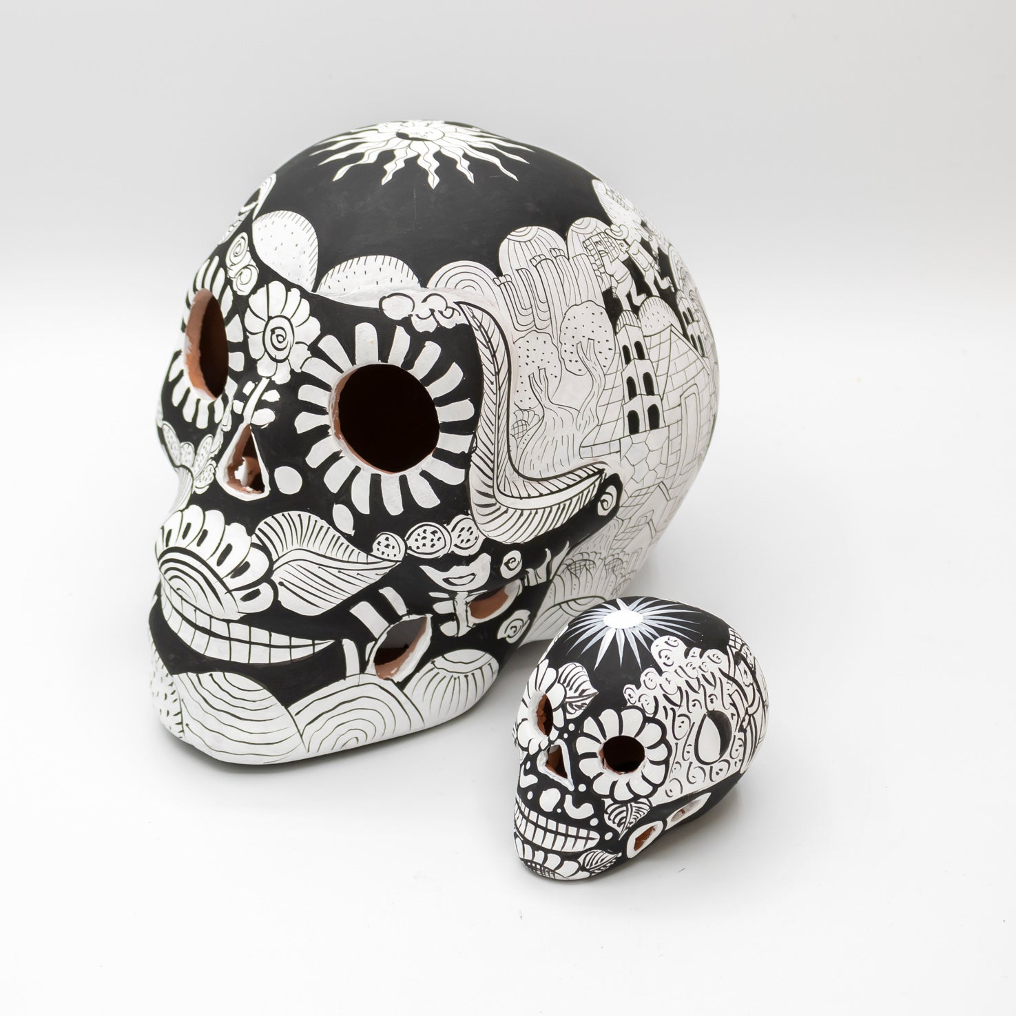 Storytelling Hand-Painted Black and White Xalitla Clay Sugar Skull