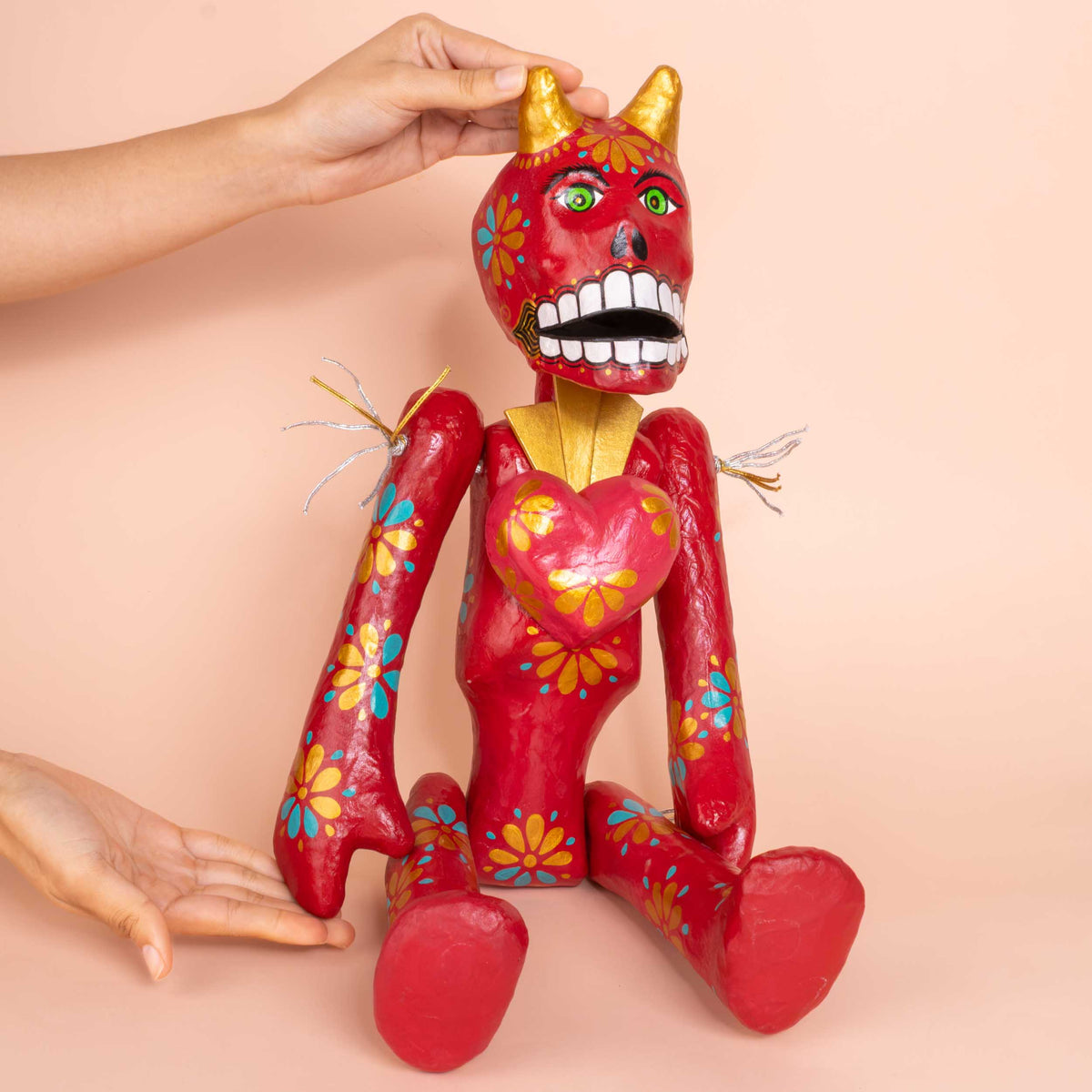 Papier-Mâché El Diablo with A Heart Sculpture