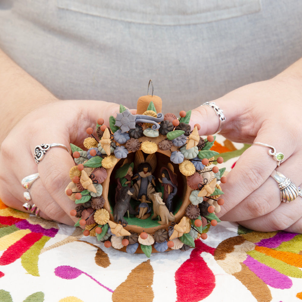 Pigmented Nativity Clay Sphere Sculpture